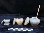 اكتشاف مقابر صخرية من عصر الدولة القديمة في أسوان تكشف عن كنوز أثرية نادرة