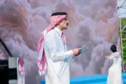 شاعر سعودي يلقي قصائده على مسرح سور الصين العظيم في مهرجان بكين
