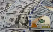 استقرار الدولار قرب أعلى مستوى في شهرين بعد تقرير وظيفي أمريكي قوي
