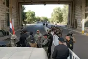 تأهب عسكري مفاجئ في بغداد وحملة فساد تطال مسؤولين بارزين
